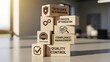 © DesignGallery - Stacked wooden blocks showing business quality management concepts