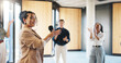 © Flash25/peopleimages.com - Applause, workshop or speaker in circle with mic, crowd motivation or appreciation for presenter. Business, group of people at seminar with tech, support or thank you clap for collaboration session.