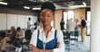 © Flash25/peopleimages.com - Business woman, serious and portrait at conference with people at upskill workshop for career opportunity. Female person, crossed arms and mission for professional development at industry symposium