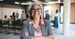 © Flash25/peopleimages.com - Portrait, conference hall or mature woman with arms crossed, confident or professional for corporate training. Smile, seminar or speaker with pride for finance knowledge, staff development or meeting