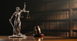 © Sikov - Legal Concept: Themis is the goddess of justice and the judge's gavel hammer as a symbol of law and order on the background of books