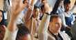 © Flash25/peopleimages.com - Business people, hands raised or question at conference for corporate training, interaction or engagement at seminar. Audience, group or employees with FAQ, ask or insight at convention or workshop