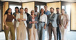 © Flash25/peopleimages.com - Portrait, team and happy with business people at conference for workshop, training seminar and mission. About us, upskill convention and synergy with group of employees in agency for solidarity