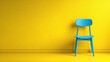 © Olga Ко - Hiring job vacancy concept with single blue chair against a yellow wall, empty office space.