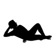 © widayanto - Silhouette of a Man Lying Down Relaxing with Hand on Head.