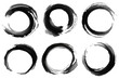 © stockdevil - Set of hand-painted black ink Enso circles. Abstract Japanese zen symbols with grunge brush stroke texture. Minimalist oriental calligraphy elements transparent background. illustration.