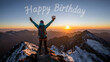 © Sahed - Person celebrating on a mountain peak at sunset with happy birthday message