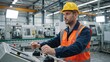 © Vasiliy - Male factory worker operating a control panel. Industrial operator in safety helmet and high-visibility vest using joysticks in a manufacturing plant. Modern manufacturing concept
