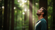 © Kamran - A serene man breathing fresh forest air in sunlight, perfect for nature therapy concepts, environmental health goals, and wellness plans
