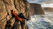 © Rendara Studio - Woman resting on a rocky cliff above crashing ocean waves