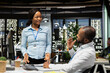 © DC Studio - African american startup team takes notes to create a new strategy and fulfill goals in a modern office, writing some data insights to forecast a global expansion. Motivation for efficiency.