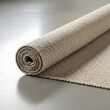 © Tajusi - Rolled Textile Floor Covering Presenting Natural Texture and Surface Detail