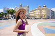 © zigres - Portrait of beautiful traveler woman strolling in the historic center of Recife, Brazil
