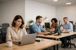 © Stefano - People working on computers in modern office