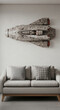 © PhotoArtHub - Interior with gray sofa and two patterned pillow. Decorative spaceship on wall, representing imagination, fantasy, and escapism in living room decor