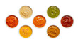 © Waqas - A variety of colorful sauces in small white bowls on transparent background