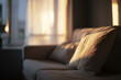 © Вікторія Пащина - Light fills a minimal living room in the morning hours highlighting soft fabrics and creating an inviting space for relaxation and quiet moments spent indoors