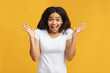 © Prostock-studio - Wow offer. Emotional african american woman expressing amazement and looking at camera over yellow background, studio shot. Unbelievable and shocked news, omg emotion concept