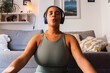 © Milles Team/Stocksy - Woman doing breathing practice