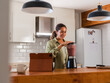© Milles Team/Stocksy - Woman making smoothie in blender