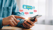 © Freelancer Rakib - Close-up of hands using a smartphone with ratings and reviews floating above the screen, illustrating user feedback and interaction.