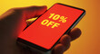 © Duran - 10% Off: A hand holding smartphone showcasing the discount offer of 10% off, capturing the essence of a deal.