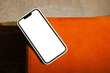 © Nuria Seguí/Stocksy - Smartphone with a blank display