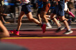© Yakov Knyazev/Stocksy - Group of runners in colorful outfits