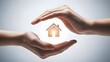 © Mayura Mihisara - Human hands protecting a glowing house icon for real estate concept