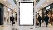 © robbi - Blank digital advertising screen in modern shopping mall. Vertical billboard mockup with white empty display in retail environment, blurred people