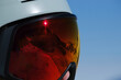 © Oleksandr Stalovierov/Stocksy - Close-up of a skier’s reflective visor with snow-covered mountains