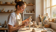 © Евгений Озолин - Young female artist sculpting clay ballerina figurine