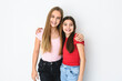 © Louis-Paul Photo - Two cute and Young pre teen girl on studio white