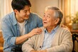 © LimeSky - Asian son converses with and supports his father in a wheelchair