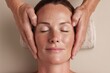 © Victoria - Caucasian mature female enjoying relaxing skincare treatment with facial massage