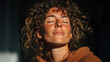 © Ala - Woman engages in peaceful breathing exercise amidst warm sunlight