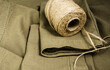 © Victoria - A natural cotton napkins set on a table with a jute rope.