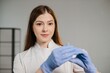 © dsheremeta - Female doctor preparing syringe for vaccination
