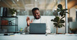 © BuyOutFelix06/peopleimages.com - Creative agency, video call and black man with laptop, greeting and virtual meeting for article proposal. African person, editor and journalist in office with tech, webinar and hello or communication