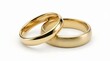 © Olivia - Two golden wedding rings on white background, symbol of love, marriage, partnership and commitment, minimal romantic jewelry design for engagement or anniversary celebration