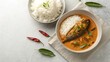 © aimanasrn - Nasi dagang, creamy coconut rice paired with spicy fish curry