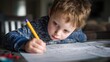 © Babb - A young child focuses on homework writing with a pencil on a sheet of paper. The child works at a table in a bright indoor setting during daytime hours.