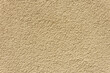 © Anastasiia - Beige stucco wall with rough texture. Plastered surface background.