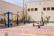 © robertobinetti70 - Outdoor old fitness area with body build equipment and gym equipment,urban setting for active lifestyle concept, Africa, Cape Verde