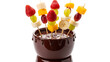 © Felippe Lopes - A bowl of chocolate fondue with fruit skewers on transparent background