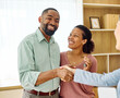 © Lumos sp - Female Real Estate Agent Selling And Showing The Modern Apartment To His Young Clients couple and shaking hands agreement deal In The Apartment