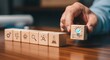 © Ridwan studio - Hand placing a wooden block with a lightbulb and checkmark icon, symbolizing idea generation and successful execution.