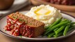 © Studio - Delicious homemade meatloaf with mashed potatoes and green beans