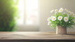 © MasTPX - A delightful bouquet of white daisies in a rustic pot sits serenely upon a weathered wooden table, bathed in gentle sunlight filte through the nearby window.