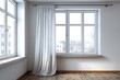 © free - Light fills a room through two windows, one with a white curtain.